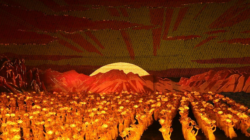 Illustration for article titled The Amazing, Colorful Flip Card Propaganda Mosaics of North Korea